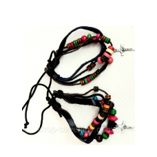 Брослети шкіряні з кулонами в кілька плетень