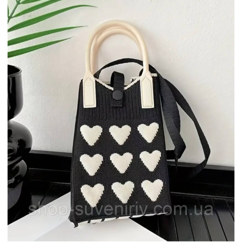 В'язана міні-сумочка для телефону В'язана міні-сумочка для телефону