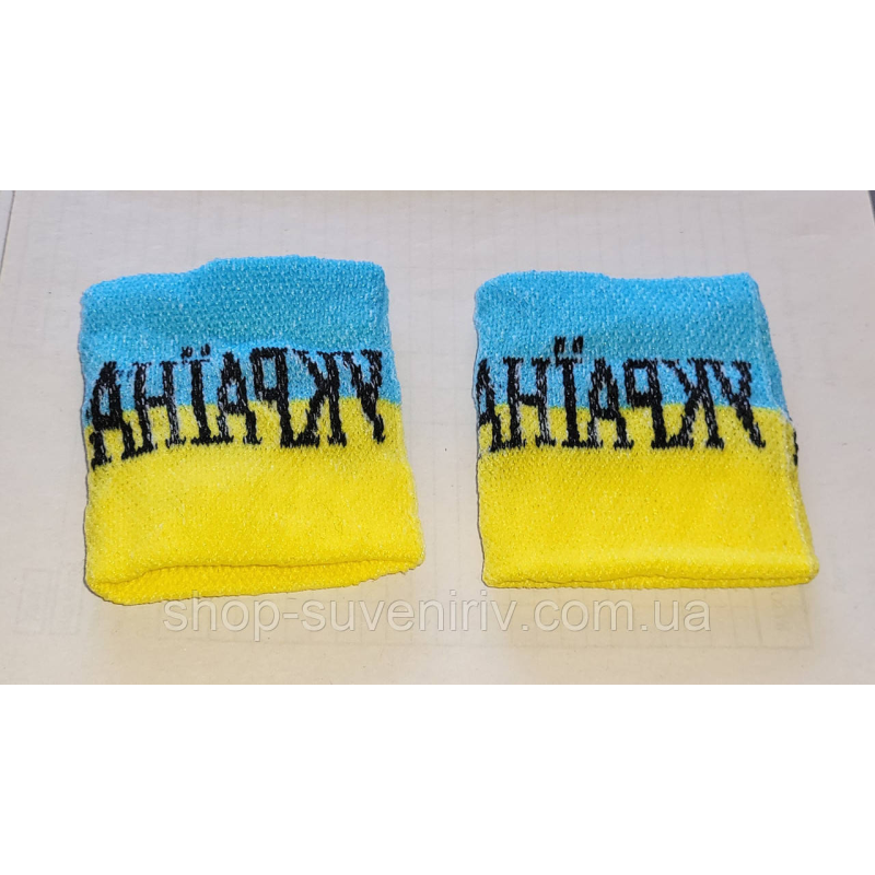 Напульсник на руку з написом Україна